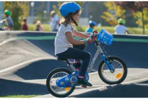 A girl riding on a pump track