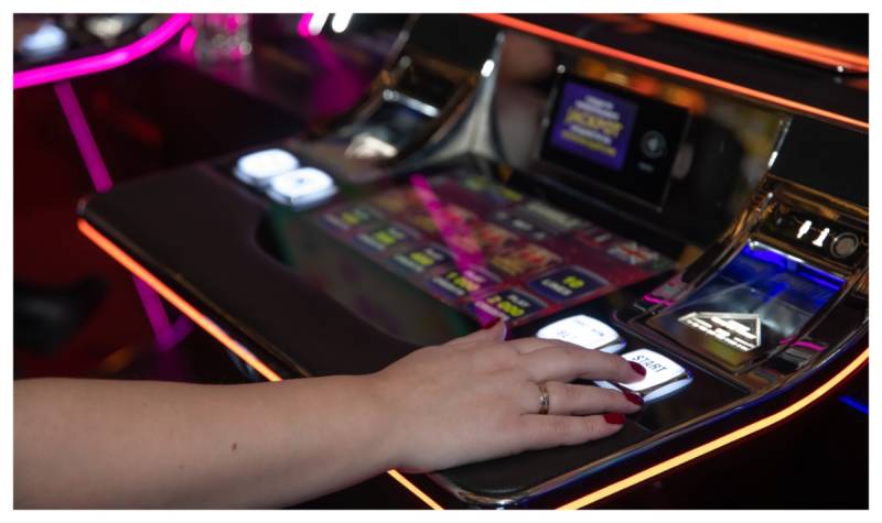 A person playing a gambling machine
